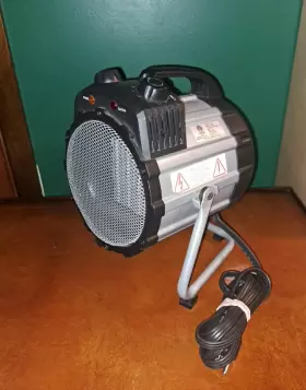 3105544 Intertek Portable Utility Ceramic Heater 2 Heat Settings With Pivoting Stand