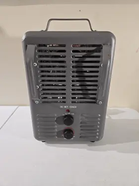 Optimus 445026240253 1500 Watt Utility Fan Heater With Thermostat Small Dent On Top. Heats Fast