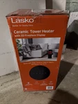 Lasko 1500 20" Black Electric Indoor Tower Fireplace Heater, 3D Flame Effect New. Price: $49.99.