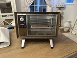 Vintage Titan Electric Space Heater Wood Finish - Model Unknown, Working Good! Used. Price: $40.00.