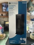 Utilitech Oscillating Ceramic Heater 5703325, 1500W, Adjustable Thermostat New. Price: $35.00.