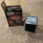 Handy Heater 1200 Watts Pure Warmth Ceramic Space - New In Box Open. Price: $14.99.