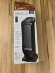 Lasko 1500W Electric Oscillating Tower Ceramic Space Heater, Black Open. Price: $30.00.