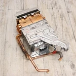 Rinnai 107000406 Heat Exchanger Assembly, Burner Unit, (ng) Manifold For V53DE Used. Price: $179.99.