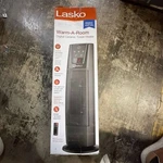 Lasko Warm-a-room Digital Ceramic Tower Heater 1500W With Oscillating Feature Open. Price: $35.00.