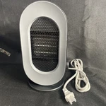 Sendowtek Portable Space Heater Indoor, Mini Electric Fan 10" Tall With 3 Modes New. Price: $17.50.