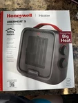 Honeywell Uberheat Portable Ceramic Space Heater 1500W Tip-over HCE210B New. Price: $31.50.