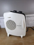 Honeywell 3-SETTING Space Heater And Fan W/ Adjustable Thermostat Used. Price: $25.99.