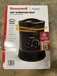 Brand New Honeywell Degree Surround Heater Model #HHF360B. Price: $37.99.