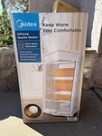 Midea 1500W Quartz Electric Space Heater, MSH20Q3AWWV, White, New. Price: $49.95.