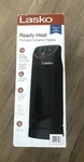 Lasko Ceramic Mini Tower Heater Cool Touch Fully Assembled 1500W 16" Nib Open. Price: $24.87.