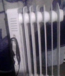 Mainstays WSH07O2AWW 1500W Portable Oil Filled Radiator - White Used. Price: $70.00.