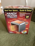 Handy Heater Pure Warmth Nib 1200 Watts As Seen On Tv Led Night Light New. Price: $35.00.