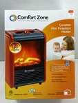 Comfort Zone 1,200-WATT Mini Ceramic Fireplace Electric Heater W/simulated Flame New. Price: $68.95.