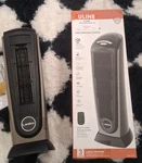 Lasko Quiet Ceramic Tower Heater With Remote Control Open. Price: $50.00.