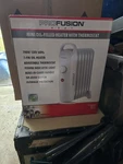 Profusion 1500W 7-FIN Oil-filled Heater New. Price: $30.00.