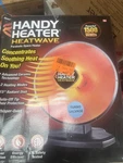 Handy Heater 1500-WATT 18.5 In. Electric Ceramic Parabolic Space New. Price: $45.00.