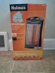 Holmes Electric Tower Quartz Heater - 1500W Safety Radiant Portable Used. Price: $49.99.
