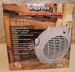 Impress IM-701 Electric Fan Heater 750W/1500W New In Box White. Price: $16.80.
