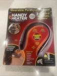 Handy Heater Freedom Wearable Personal Cordless Open. Price: $10.50.