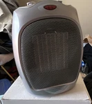 Amazon Basics Portable Electric Space Heater Silver 1500W Retails $27 Used. Price: $18.00.