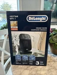 Delonghi Ceramic Heater #857268 Open. Price: $35.00.