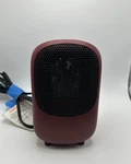 Mainstays Mini Ceramic Heater, Maroon Color, Very Nice, Works Great! Used. Price: $15.95.