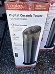 Lasko CT22495 22" Ceramic Tower Heater With Remote Control New. Price: $15.00.
