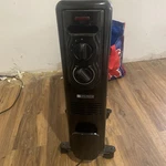 Sai Radiator Heater 1500W Oil Filled Electric Black Used. Price: $54.00.