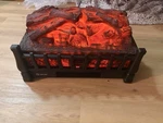 Cixi Xinxiuli Electric Fireplace Insert Log Quartz IH-2093 Remote 1500W New. Price: $75.00.