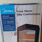 Midea Infrared Quartz Heater Ultra Quiet, Adjustable Thermostat, 1500W, Black New. Price: $89.00.