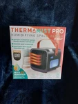 Thermamist Pro 800WATT Humidifying Space Heater New. Price: $19.00.