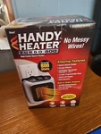 Handy Heater Turbo Wall-outlet Space New. Price: $20.00.
