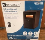 Utilitech 5228422 Infrared Heater, Thermostat, Remote, 300 Sq Ft, Walnut New. Price: $80.00.