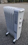 Mainstays 1500W Mechanical Oil Filled Electric Radiator Heater WSH07O2AWW White Used. Price: $29.39.