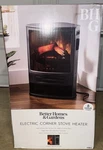 Better Homes & Gardens Indoor Electric Corner Stove Heater + Remote (SHAG-G36E) Open. Price: $99.99.
