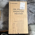 Pelonis NY1507-14A Oil-filled Radiator Heater 1500W Black Thermostat Remote Open. Price: $53.99.