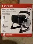 Lasko 5919 1500W Pro-ceramic Utility Electric Portable Heater Black New. Price: $40.00.
