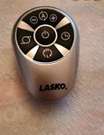 Lasko Silver Tower Heater/fan Remote Control Model 2033602 Open. Price: $10.00.