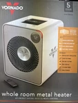 Vornado VMH500 Metal Whole Room Heater With Auto Climate Control - White Open. Price: $99.00.