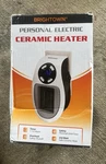Brightown 350 Watt Personal Electric Ceramic Heater Wall Timer Led Display Nib Open. Price: $25.00.