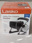 Lasko 1500-WATT Electric Pro-ceramic Utility Portable Space Heater LKO-5919 New. Price: $55.00.