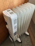 Comfort Zone Oil-filled Radiator Space Heater (2 Available) Used. Price: $25.00.