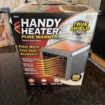 Handy Heater Pure Warmth Ceramic Space 1200 Watts Auto Off Tip New. Price: $19.50.