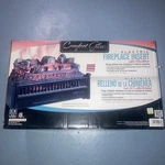 Brand New Comfort Glow Electric Log Set With Heater.. Price: $99.00.