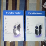 Portable Heaters New In Box (2). Price: $39.98.