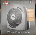 Vornado 1500W Electric Portable Whole Room Heater Open. Price: $44.99.