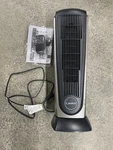 Lasko Oscillating 1500W Portable Ceramic Tower Space Heater W/remote Control Used. Price: $37.99.