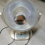 Optimus H-4438 14" Oscillating Dish Heater With Timer Used. Price: $55.00.