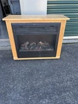 Amish Crafted Heat Surge Light Oak Roll N Glow Electric Fireplace Model X23A Used. Price: $125.00.